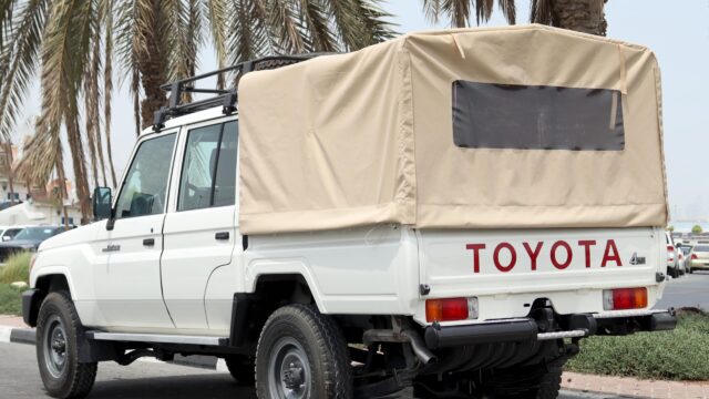 Toyota vehicles prepared for export in Dubai including Land Cruiser and LC79 models for global markets